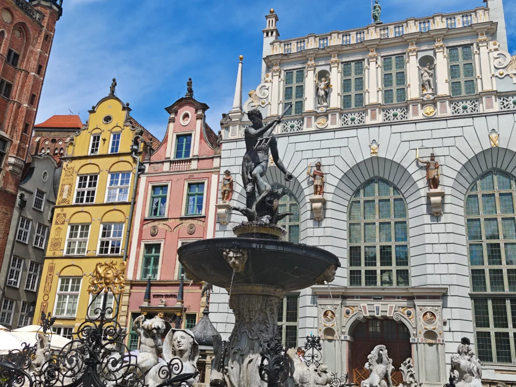 beautiful town centre of gdansk poland with colorful houses and nepture fountain