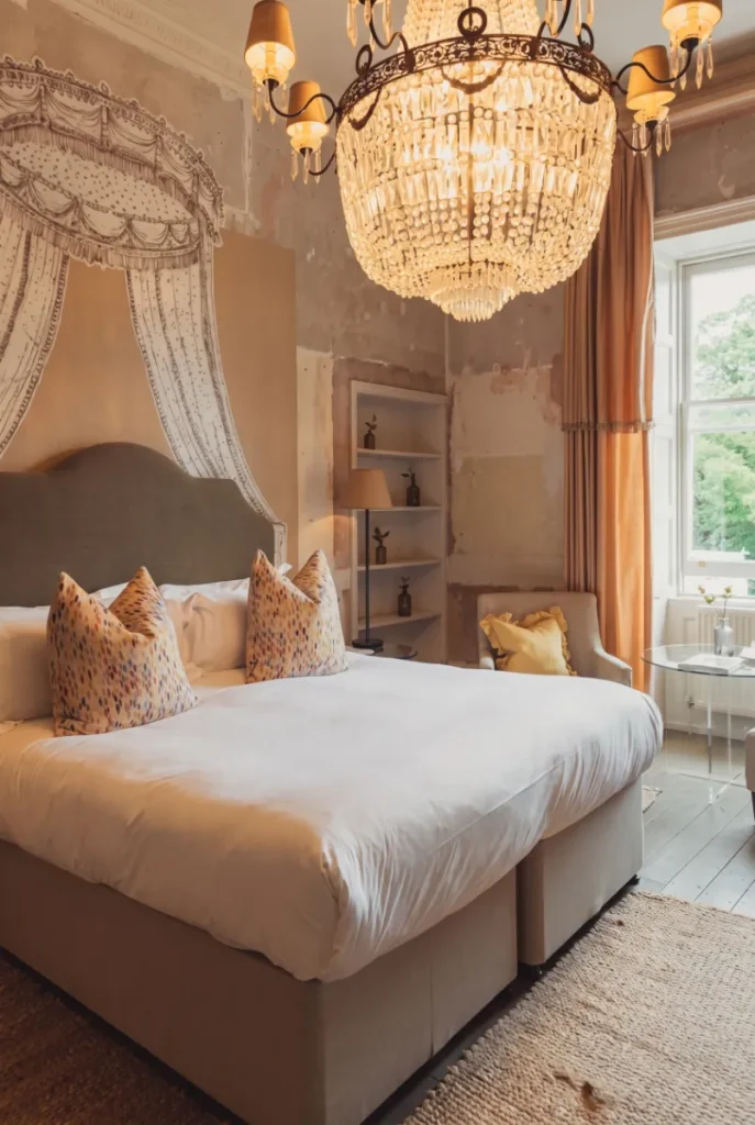 the ornate bedroom with chandelier of the boutique hotel no 15 by guesthouse bath